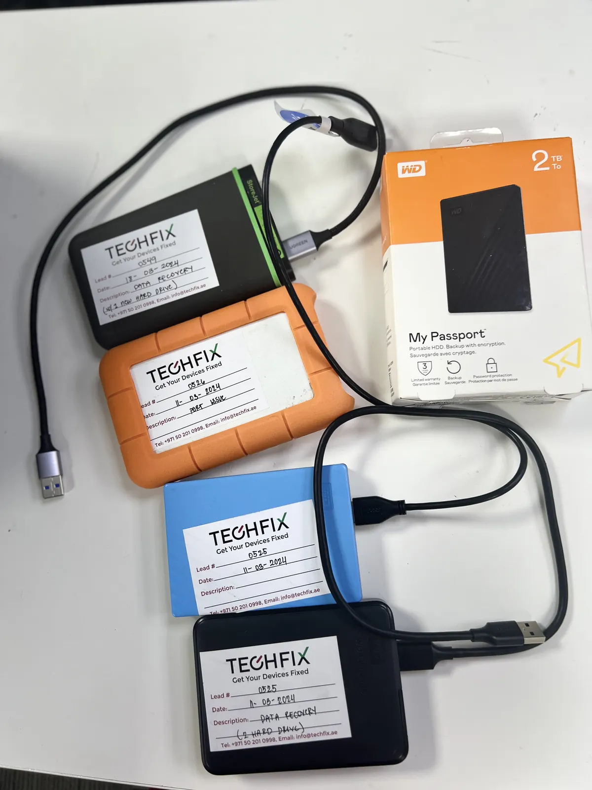 TechFix external drives and adapters used for data transfer and recovery